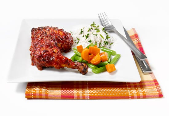Barbecued chicken thighs with spices and maple