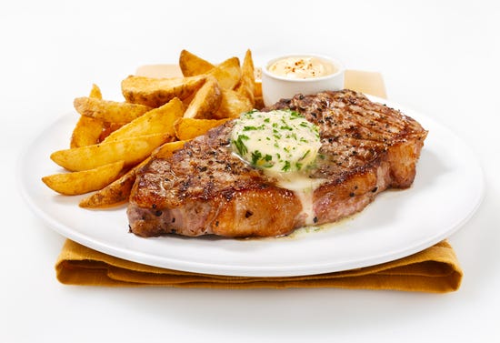 Grilled entrecôte with herbed butter