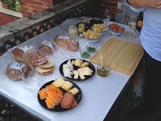 Various breads and cheeses displayed on a table