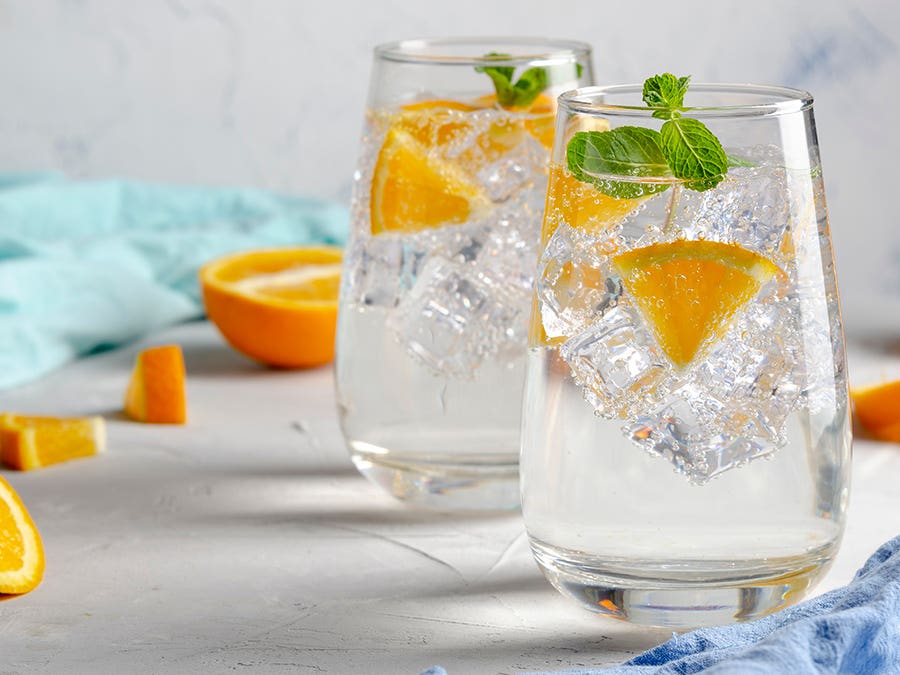 Seltzer on ice with mint and orange