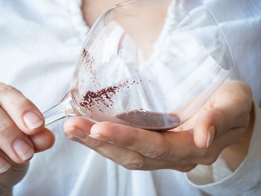 Glasse of wine with sediment