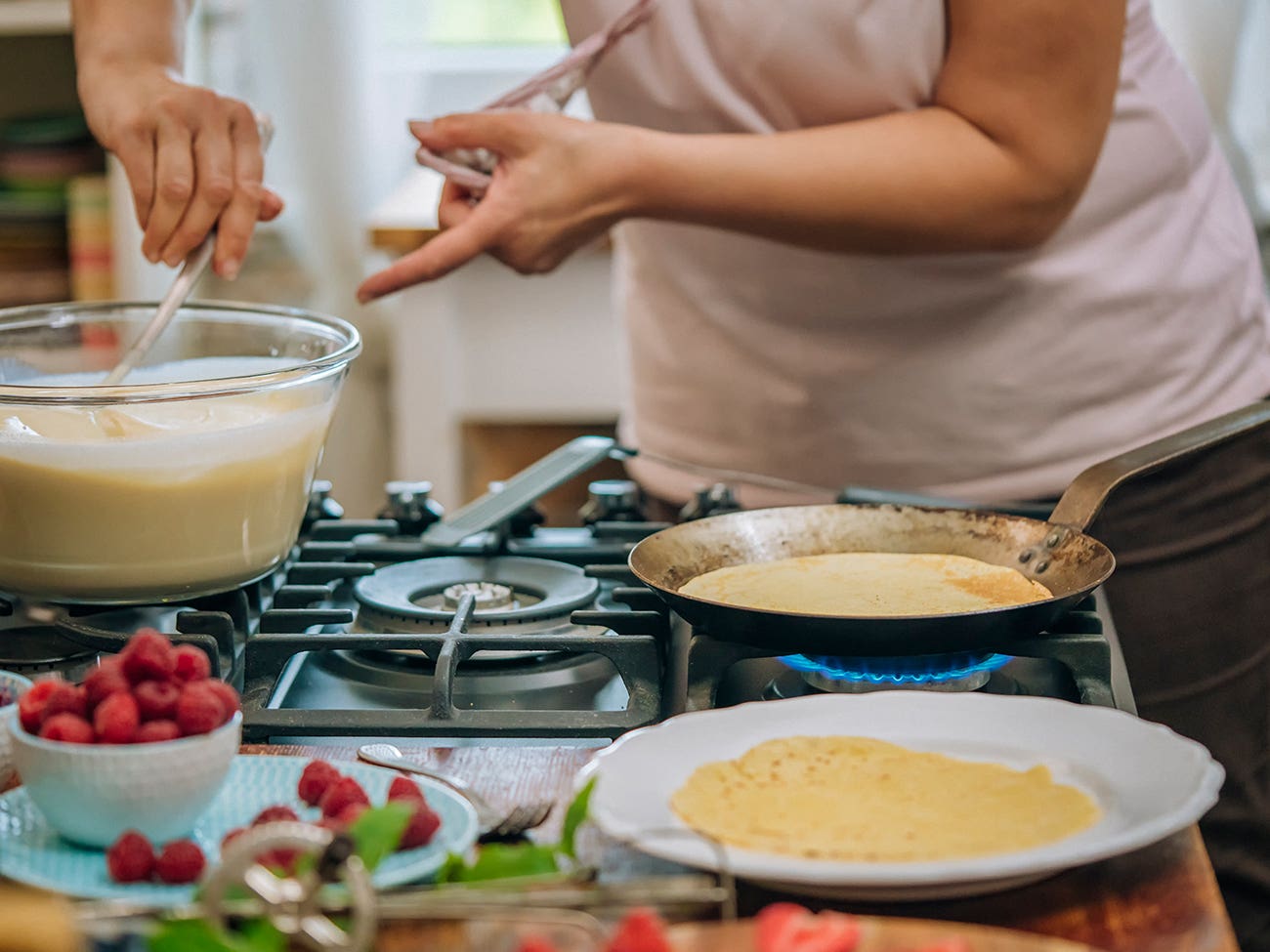 Cooking crepes Cooking crepes