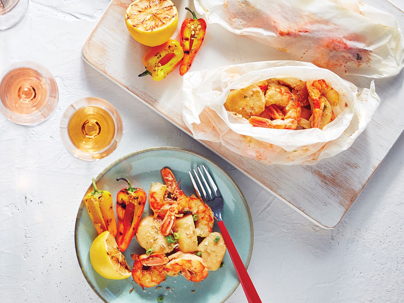 Scallops and shrimp en papillote with fennel and basil