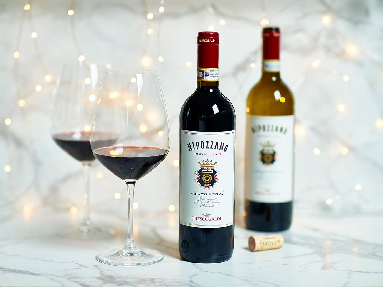 2 bottles of Riserva wine and 2 glasses 2 bottles of Riserva wine and 2 glasses