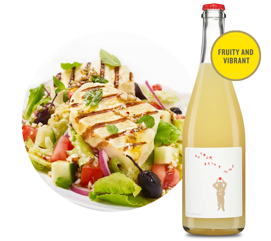 Grilled halloumi cheese on mixed salad