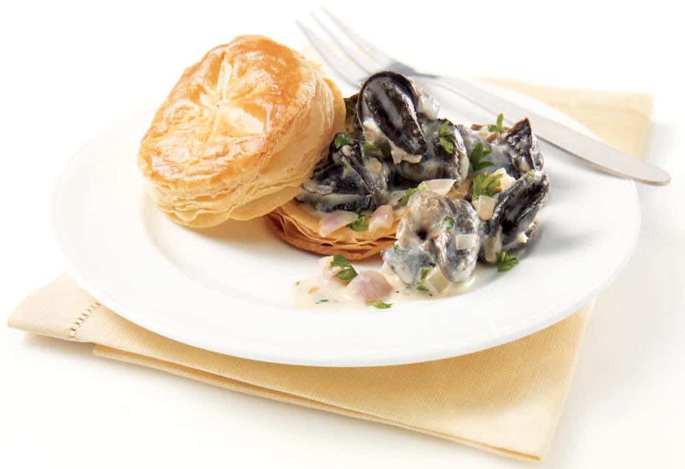 Escargot and goat cheese puff pastries