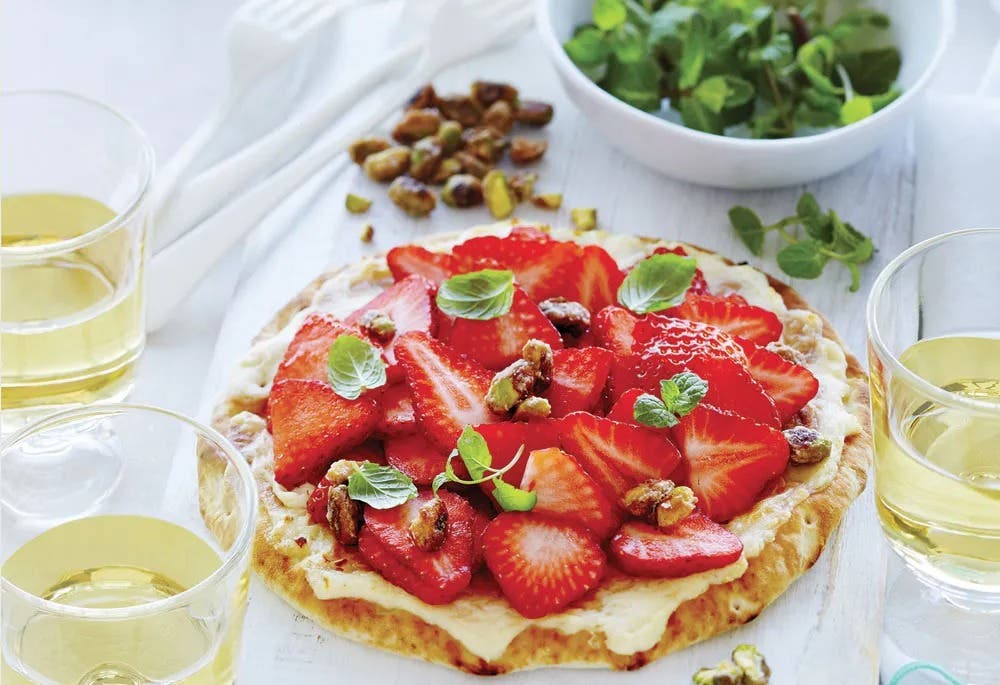 Brunch pizza with mascarpone and strawberries